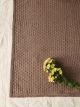 Nr 2 Sommerfugl Teppe strikket i Mandarin Petit fra Sandnes Garn